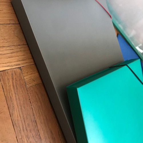 Plastic bag, thick plastic folders, cardboard folders and slides like new