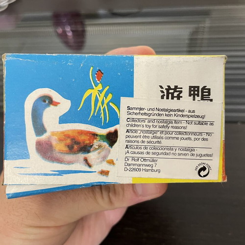 Tin duck vintage toy used with original box, Chinese made