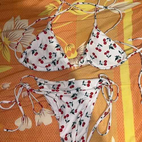 Swimsuit like new, black and multicolor, sizes XS and S