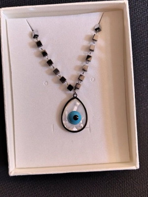 Pendant with evil eye like new, black and silver