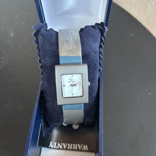 Women's Oskar de la Renta titanium watch completely new