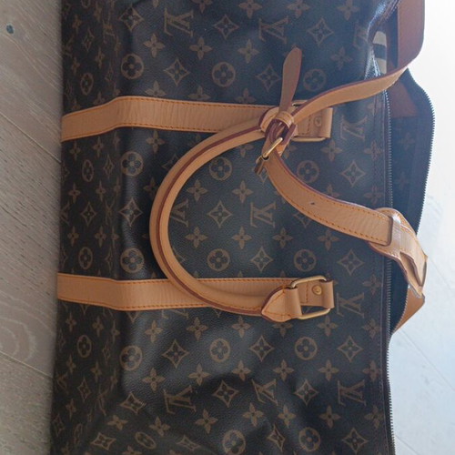Travel bag used, brown, dimensions 30x60, zipper needs replacement