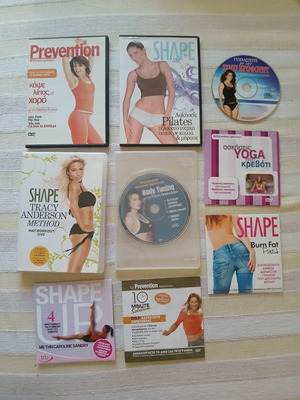 9 DVDs with fitness, pilates, wellness and yoga programs like new