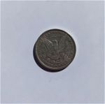 One Morgan silver Dollar