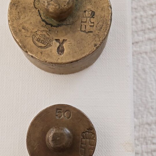 Old brass scale weights 50g & 200g with official stamps, antiques