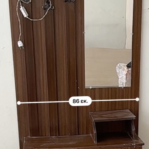 Vintage entrance furniture used with hooks, mirror and light