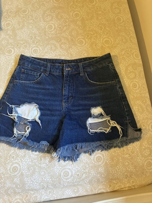 Sisley denim shorts like new with rips, size S 36 8, blue and yellow