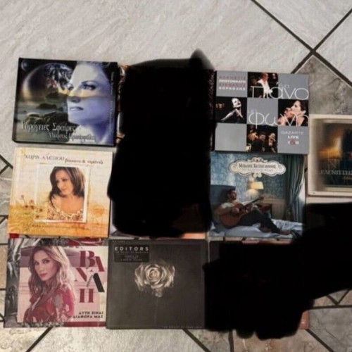 Collection of authentic CDs by Greek and international artists