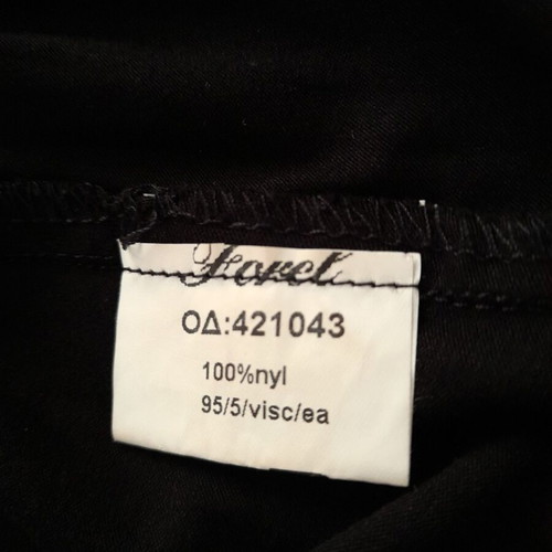 Women's sleeveless black blouse with white pearls size L like new
