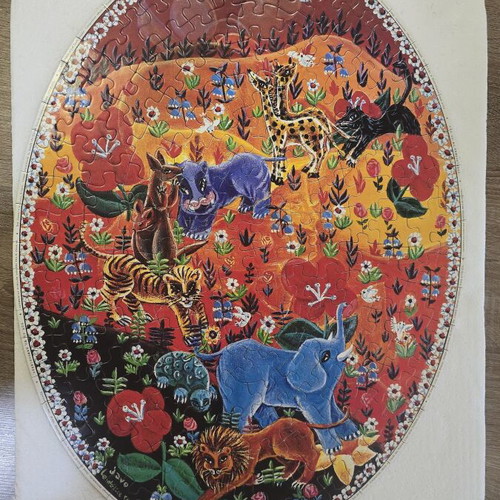 Unicef Red Delirium Puzzle like new, rare collector's item
