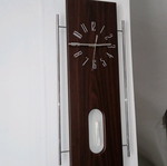 Pendulum wall clock like new, brown wenge