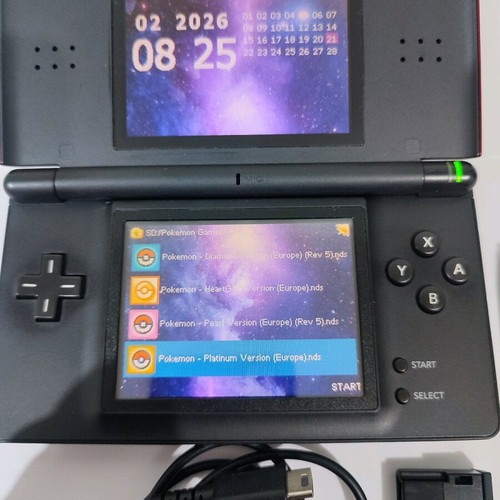 Nintendo DS Lite console with Pokemon LeafGreen cartridge used