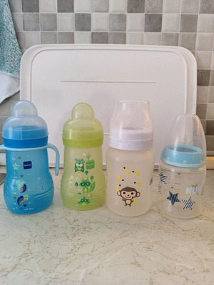 Baby bottles used without nipples, 2 Mam, 1 Philips Avent, 1 Nuk