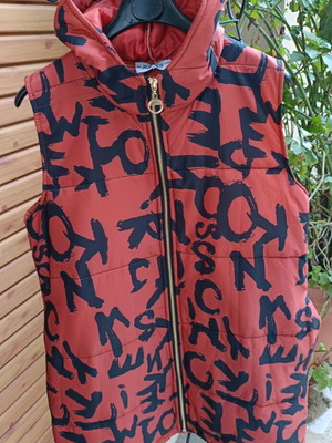 Quilted sleeveless jacket orange sun-faded with hood one size new