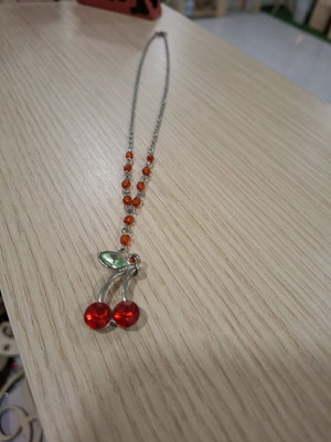 Cherry necklace like new with red cherries and silver chain