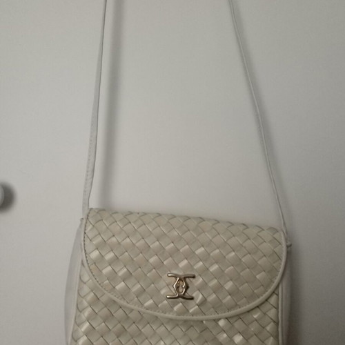 White shoulder bag used, leather with gold detail