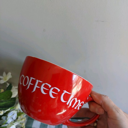Large mug used for coffee or cereals, red