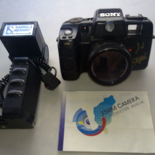 Sony 35mm film camera with 50mm lens and flash like new