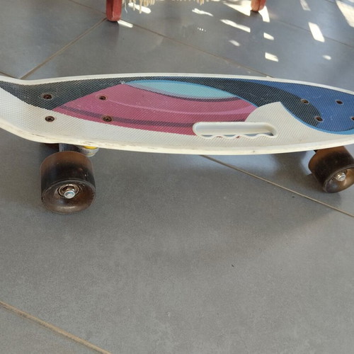 Skateboard used with light-up wheels and protective gear