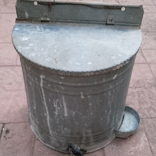Vintage galvanized water storage with plastic tap used