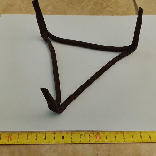 Wrought iron old fireplace trivet used