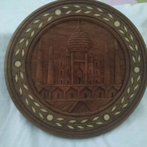 Wooden carved wall decoration