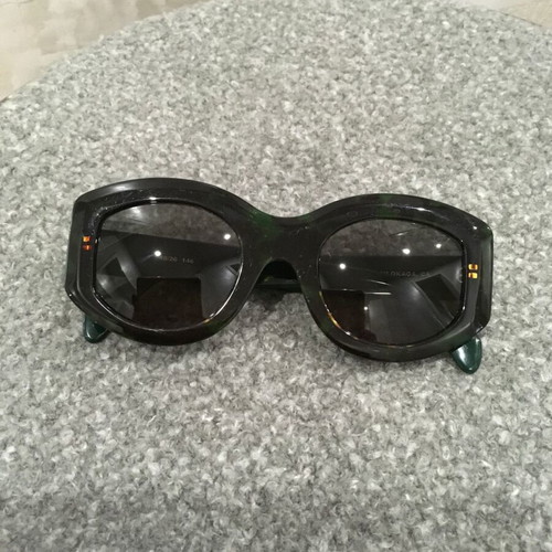 Golf Wang sunglasses used with thick tortoise-shell frame