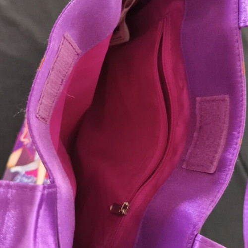 Las Divinas shoulder bag like new, multicolor purple