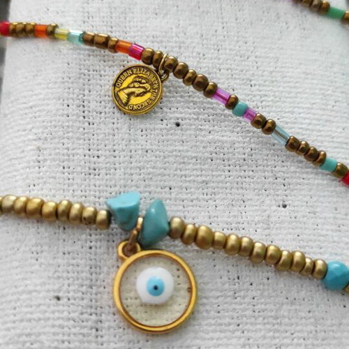 Anklet with gold-colored beads and semi-precious heart charm like new