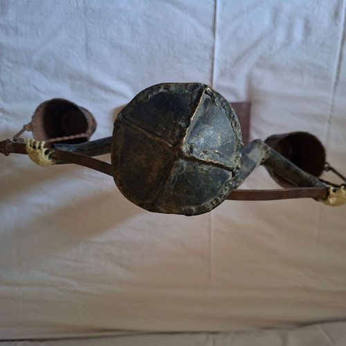 Asian Water Carrier Decorative Figurine like new, metal with wooden base