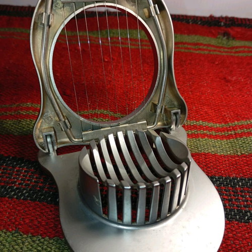 Metal egg slicer used