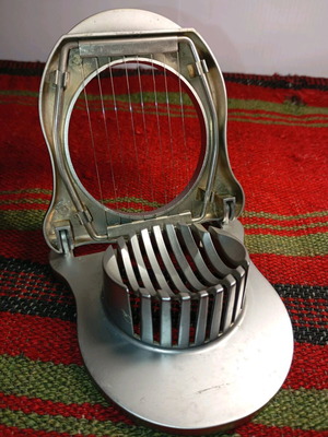 Metal egg slicer used
