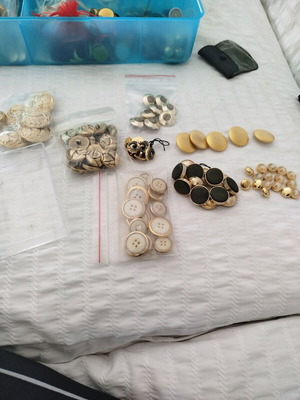 Various gold buttons like new with beautiful designs