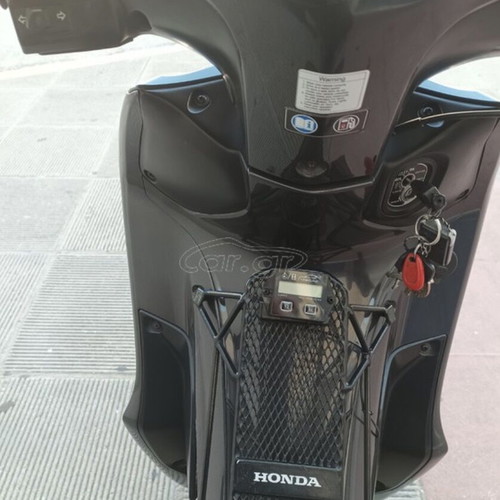 Honda Supra 125 X motorcycle with Helm-in, 2015 model