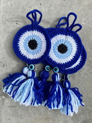 Handmade knitted evil eyes made to order for baptism favors