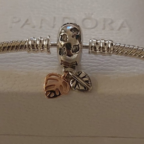 Pandora bracelet size 18 with round clasp and two leaf charms