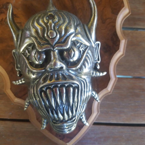 Decorative wall hanging used with swords