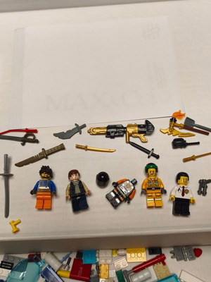Lego lot like new with figures, weapons, and bricks