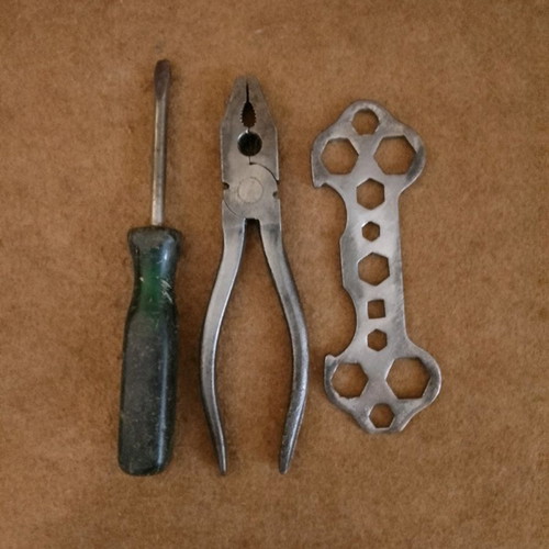 Bicycle tools used, including wrench, screwdriver and pliers