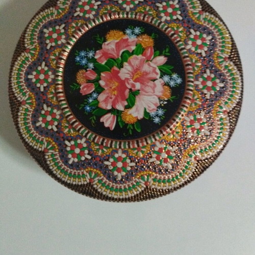 Vintage metal box with embossed floral design and Pointillism mosaic