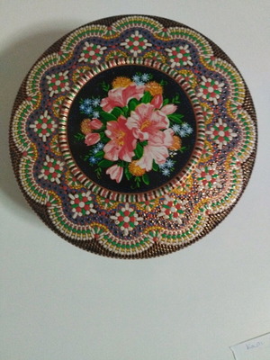 Vintage metal box with embossed floral design and Pointillism mosaic