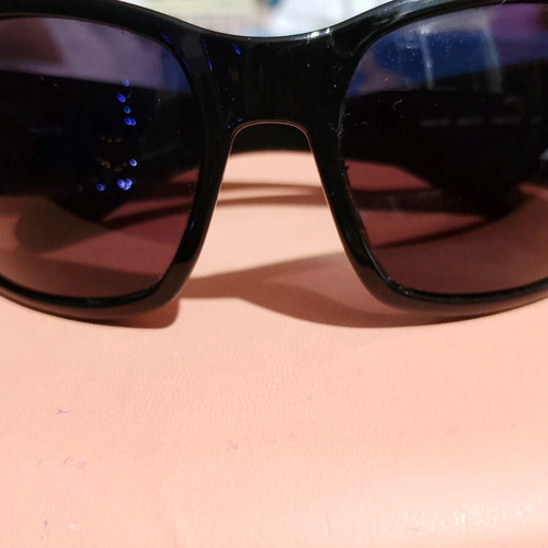 Miu Miu sunglasses used with case and cloth, black and gold