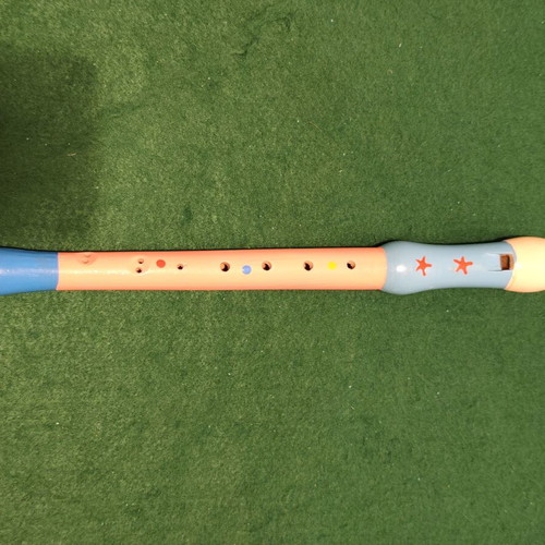 Children's wooden recorder with colorful designs