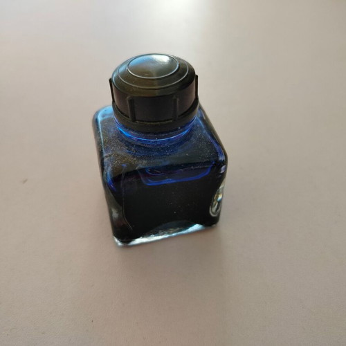 Menounos ink in glass bottle used, 60s-70s era