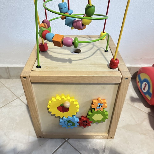 Wooden educational activity cube for children