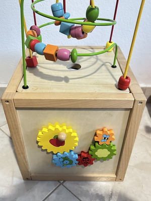 Wooden educational activity cube for children