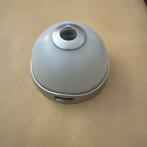 Alarm clock with light used, projects time on ceiling