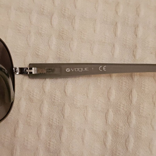 Vogue sunglasses, silver and black frame, modern style