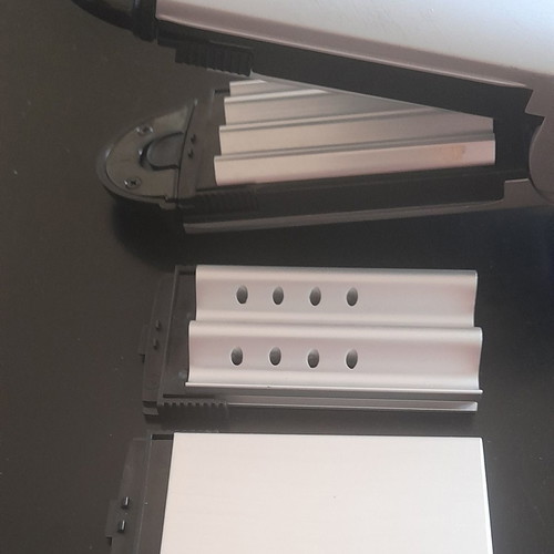 Babyliss hair straightener with three plates used and steam