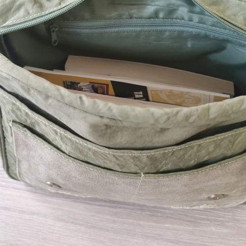 Sisley crossbody school bag used in green color